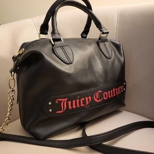 Sexy black and red juicy couture purse with cross body strap as well as handles